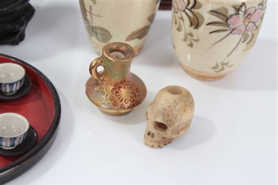 Lot 2747 - Miniature Japanese carved bone netsuke in the form of a skull, 1cm high,  together with miniature Japanese urn stand, group of Oriental miniature vases and other Oriental dolls house furnishings