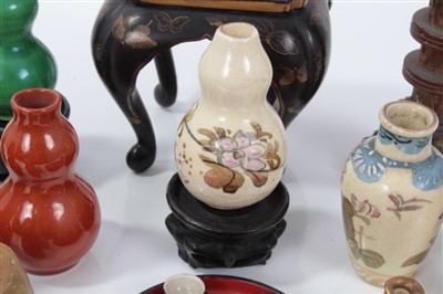 Lot 2747 - Miniature Japanese carved bone netsuke in the form of a skull, 1cm high,  together with miniature Japanese urn stand, group of Oriental miniature vases and other Oriental dolls house furnishings