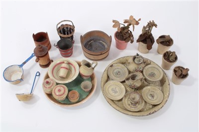 Lot 2748 - Antique miniature painted tea set on circular tray, the tray 7cm diameter, together with another similar, pots and pans, flower pots and other antique dolls house pieces