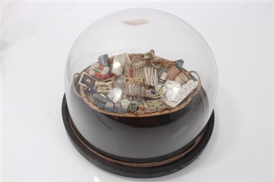 Lot 2764 - 19th century miniature peddler’s basket, extensively fitted, under glass dome, 15cm high