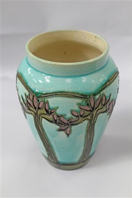 Lot 2179 - Minton Sessionist vase with tube lined floral decoration