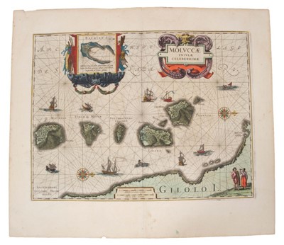 Lot 956 - Guijelmus Blaeu (1571-1638), hand-coloured map - ‘Moluccae Insulae Celeberrimae’, 1630, German text verso, 38cm x 48cm.