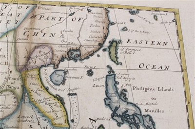 Lot 989 - Edward Wells (1667-1727), hand-coloured map - ‘A New Map of the East Indies’, 1700, 36cm x 50cm (severe staining).