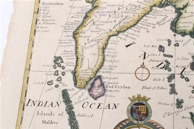 Lot 989 - Edward Wells (1667-1727), hand-coloured map - ‘A New Map of the East Indies’, 1700, 36cm x 50cm (severe staining).