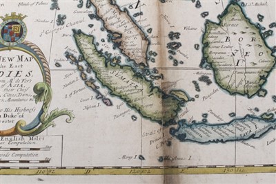 Lot 989 - Edward Wells (1667-1727), hand-coloured map - ‘A New Map of the East Indies’, 1700, 36cm x 50cm (severe staining).