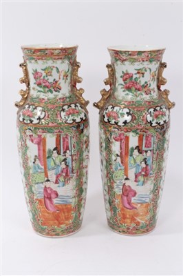 Lot 144 - Pair of 19th century Chinese Canton vases, together with Chinese baluster blue and white vase and cover