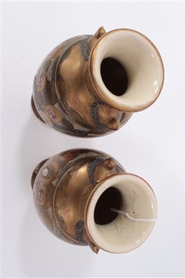 Lot 145 - Pair of Meiji Japanese satsuma vases, decorated with immortals