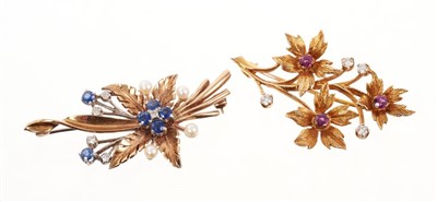 Lot 444 - Two gold and fancy stone brooches