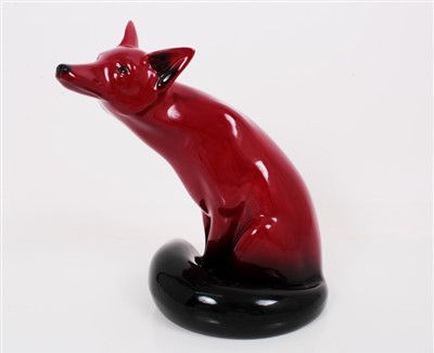 Lot 2038 - Royal Doulton Flambe model of a seated fox, Beswick model of a fox no.2438, together with another Beswick figure of a Siamese cat no.2139 (3)