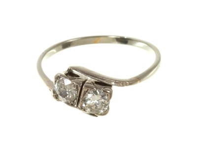 Lot 485 - Diamond two-stone ring with two old cut diamonds estimated to weigh approximately 0.50cts in total, in crossover setting