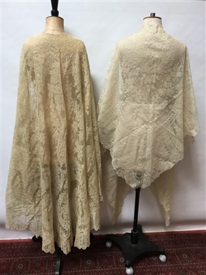 Lot 3066 - Antique and later lace including decorated net lace cape, similar table cloth, tambour lace square, needle decorated shawl.