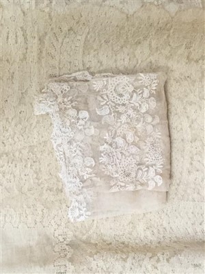 Lot 3066 - Antique and later lace including decorated net lace cape, similar table cloth, tambour lace square, needle decorated shawl.