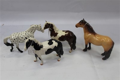 Lot 2041 - Four Beswick horses - Appaloosa, Spotted Walking Pony,  Piebald, Skewbald and Highland