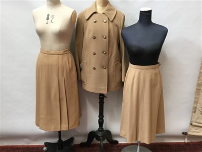 Lot 3088 - Ladies Burberrys' short jacket size 10, two Burberrys skirts. A wool camel 3/4 coat by Ormdale and two camel skirts by Jaeger new with tags. Two Dereta gilets, one wool one brown suede.