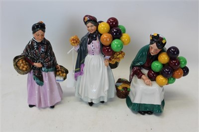 Lot 2062 - Three Royal Doulton figures - Biddy Pennyfarthing HN1843, The Old Balloon Seller HN1315 and The Orange Lady