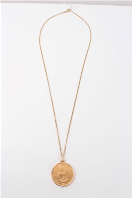 Lot 3328 - Gold 1/4 Krugerrand coin pendant on chain