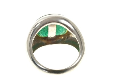 Lot 455 - Green cabochon stone ring in white gold setting