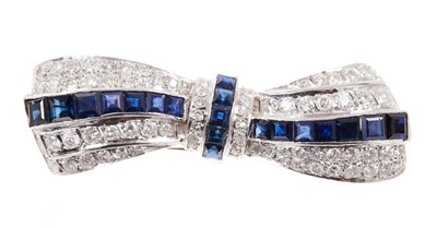 Lot 447 - Sapphire and diamond bow brooch