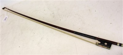 Lot 121 - Antique violin bow, stamped Nach Vuillaume, with abalone inlaid ebony frog, 73cm long
