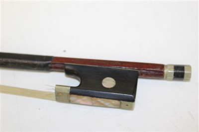 Lot 121 - Antique violin bow, stamped Nach Vuillaume, with abalone inlaid ebony frog, 73cm long