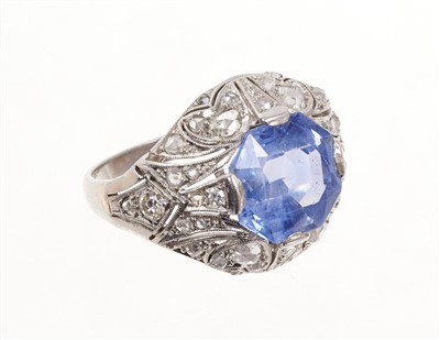 Lot 440 - Art Deco sapphire and diamond ring with an octagonal facet cut cornflower blue sapphire measuring approximately 10.55mm x 9.70mm x 5.11mm, in platinum bombé setting with brilliant cut, single cut a...