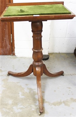 Lot 1386 - Early Victorian mahogany reading table, with rest adjusting on easel support, raising on turned column and tripod supports, 51cm wide