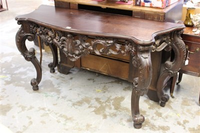 Lot 1395 - George III style mahogany hall table, of serpentine outline with pierced floral scroll frieze on acanthus carved cabriole legs, 156cm wide x 52cm deep x 92cm high