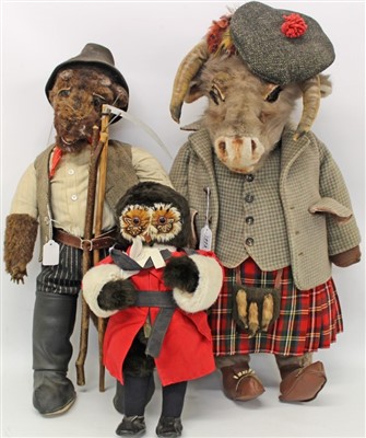 Lot 2773 - Large character soft toy goat dressed as a Scottish laird, another soft toy dressed as a farmer holding a scythe and an owl judge (3)