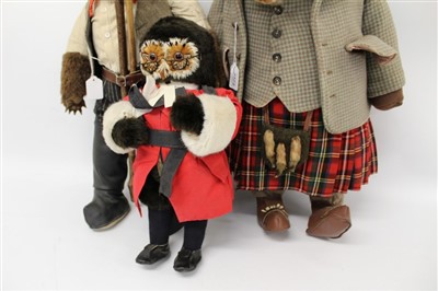 Lot 2773 - Large character soft toy goat dressed as a Scottish laird, another soft toy dressed as a farmer holding a scythe and an owl judge (3)