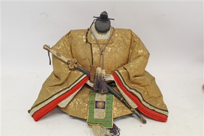Lot 41 - Late 19th/Early 20th century Japanese Empress and Emperor (head missing) plus three other Oriental dolls all in original clothing (5)