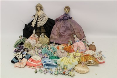 Lot 2779 - Collection of ceramic half dolls and pin cushions, various sizes, including two large 1930s painted plaster half dolls (38 in total)