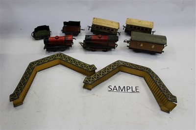 Lot 2862 - Collection tinplate trains, 0 gauge, carriages, wagons and accessories.