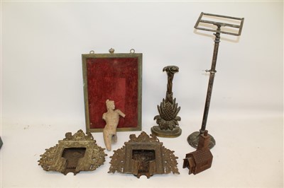 Lot 3574 - Two 19th century cast iron miniature models of fireplaces, by Greenlees, Glasgow, 27cm wide, together with silver plated adjustable stand, doorstop, 19th century brass photo frame, carved wooden co...