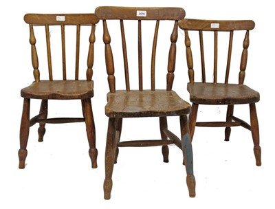 Lot 3576 - Set of five early 20th century elm and beech child’s chairs, each with stick backs and solid seat on turned legs