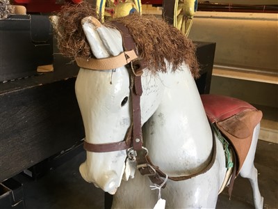 Lot 3581 - Antique painted wood rocking horse figure, dapple grey finish, now lacking base, 92cm long