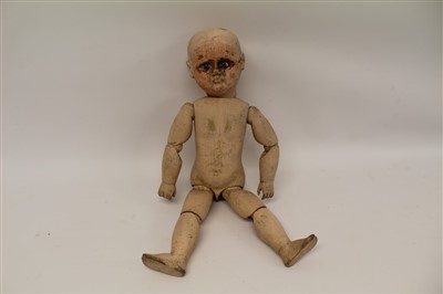 Lot 2790 - 19th century carved wooden painted doll with blue inset eyes and ball jointed limbs