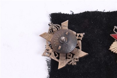 Lot 514 - Imperial Russian decoration, together with a Soviet Order of the Red Star and an Order of the Patriotic War (3)