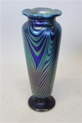 Lot 2083 - Okra Glass Studios ‘Nebular’ iridescent glass vase designed by Richard Golding and made by Nicola Osborne, signed ‘Okra 88 NTV No. 11’ with original card label and box. height 21.5 cm