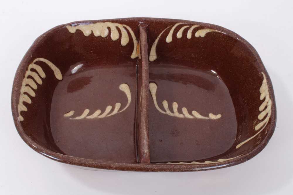 Lot 146 - 19th century slip ware dish with central division