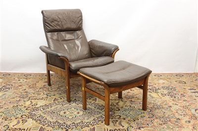 Lot 1310 - Vintage Swedish leather recliner chair and footstool