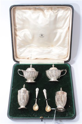 Lot 250 - Silver condiment set in fitted case