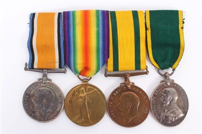 Lot 519 - First World War Territorial Medal Group, comprising War, Victory and First World War Territorial Medal together with George V Territorial efficiency medal