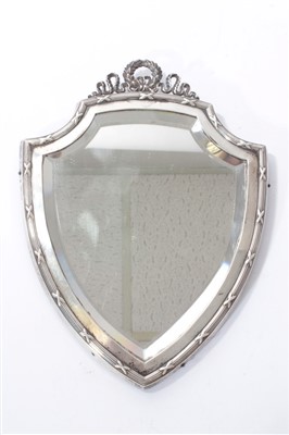 Lot 327 - Silver framed mirror in the form of a sheild - birm