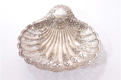 Lot 347 - Silver bonbon dish, of shell form with pierced decoration, and presentation inscription- 1911