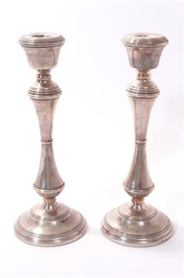 Lot 228 - Pair of Contemporary silver candlesticks