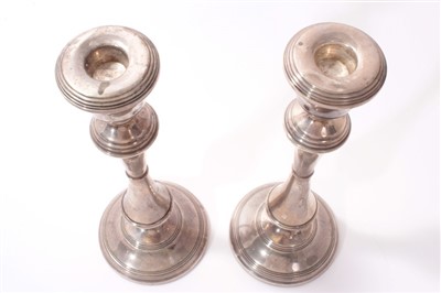 Lot 228 - Pair of Contemporary silver candlesticks