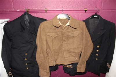 Lot 567 - Group of assorted British military uniforms to include Second World War Royal Navy Tunics by Austin Reed, together with a Battle Dress Blouse and other uniform.