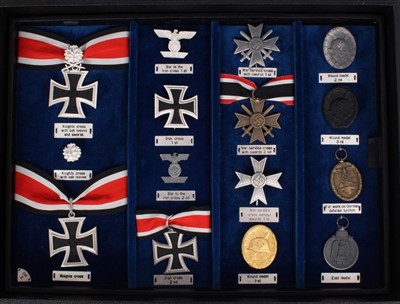 Lot 607 - Extensive collection of fifty three Nazi orders and decorations, including War badges, German Cross, Iron