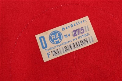 Lot 553 - Nazi party arm band with RZM paper label to interior - numbered 344698