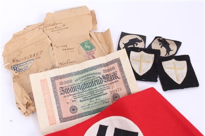 Lot 555 - Nazi party arm band with RZM paper label to interior, numbered - 344686 together with some other cloth badges